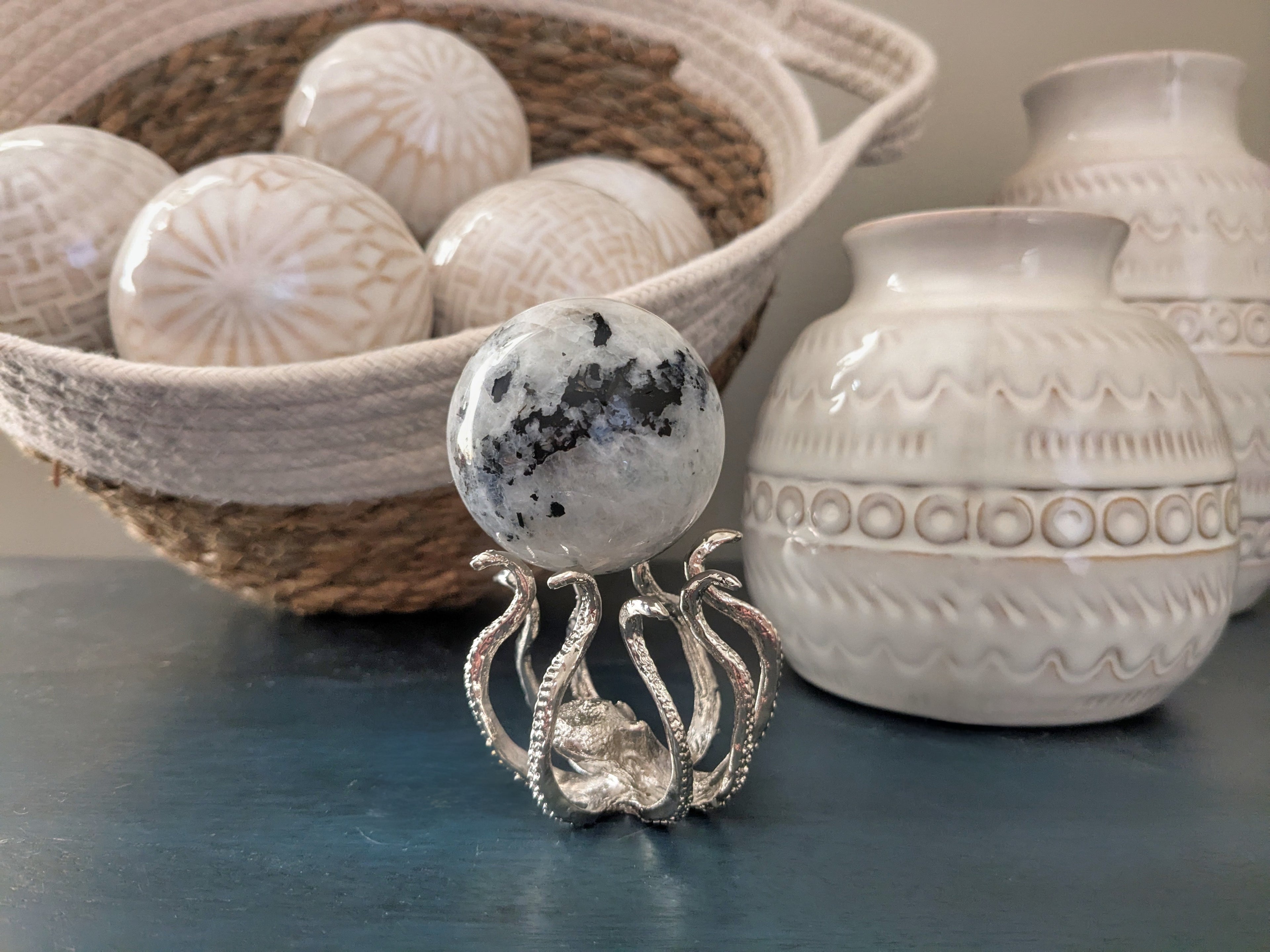Moonstone Sphere with Silver Octopus Stand