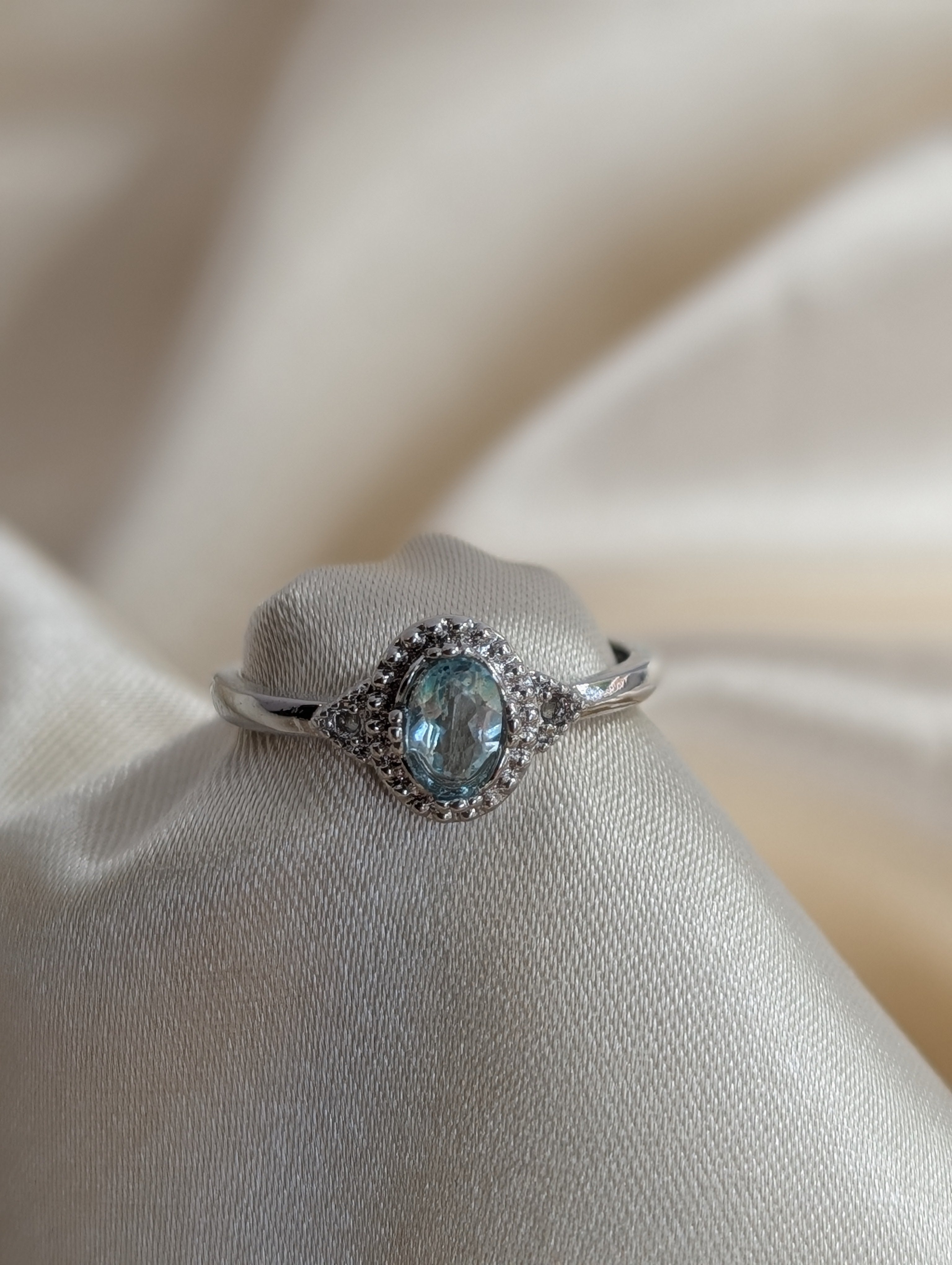 Blue Topaz Halo Adjustable Ring
